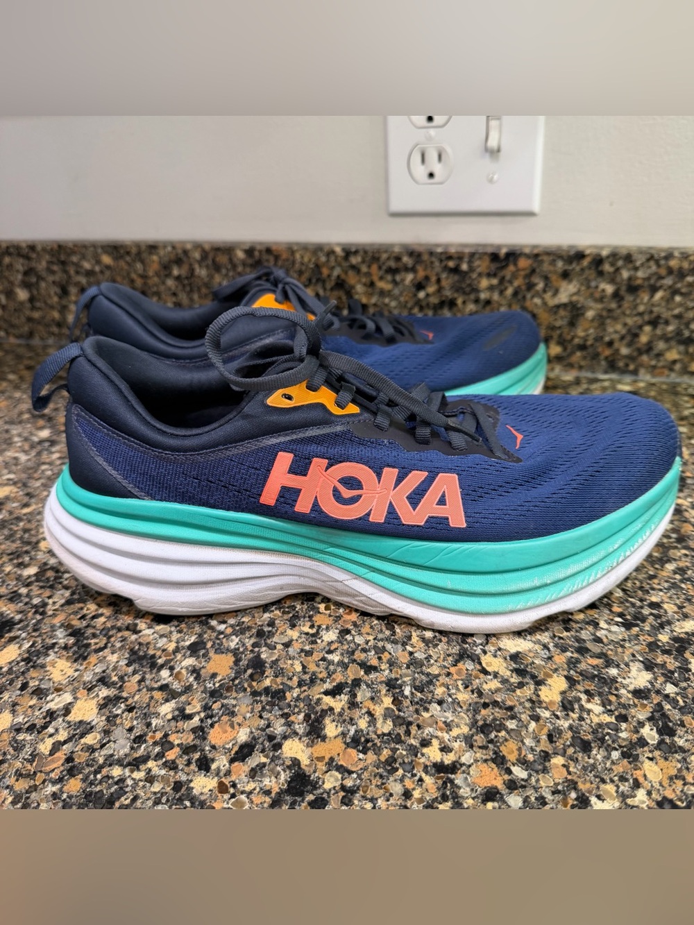 Hoka Black and Bright Blue Interior Shoe Tag